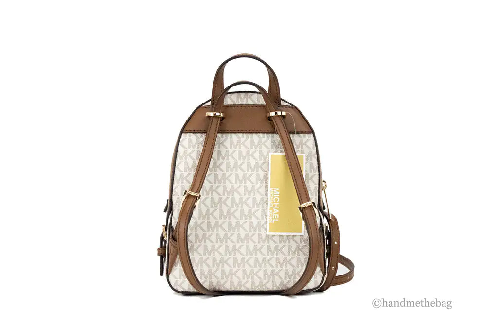 Michael Kors Jaycee XS Vanilla Signature PVC Zip Pocket Shoulder Backpack Bag